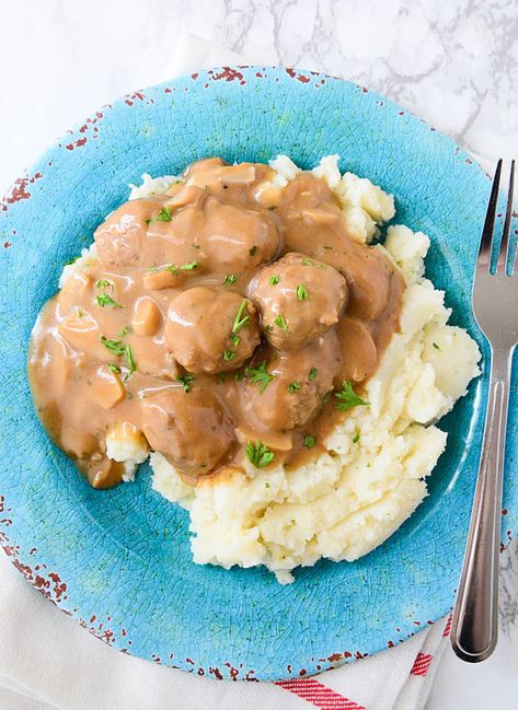 cream of mushroom meatballs is the ultimate in comfort food. So easily done in the slow cooker. Mushroom Soup Slow Cooker, Cream Of Mushroom Meatballs, Meatballs Cream Of Mushroom Soup, Mushroom Meatballs, Soup Slow Cooker, Dinner Favorites, Crock Pot Meatballs, Yummy Dishes, Slow Cooker Meatballs