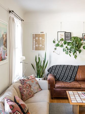 A Homepolish Pro's Stylish Abode — & How You Can Copy It #refinery29 http://www.refinery29.com/homepolish-san-francisco#slide3 "I love textiles for all the diversity they bring to a space, both visually and culturally. They make it anything but cookie-cutter. I’ve collected my kilim pillows from eBay and Craigslist, and I found my black-and-white African mud cloth on eBay. In other rooms, I’ve even framed textiles as wall art." Living Room Ideas Green Couch, Couch Shelves, Living Room Ideas Green, Room Ideas Green, Mismatched Living Room Furniture, Green Couch, Current Fashion, Room Redo, Plywood Furniture