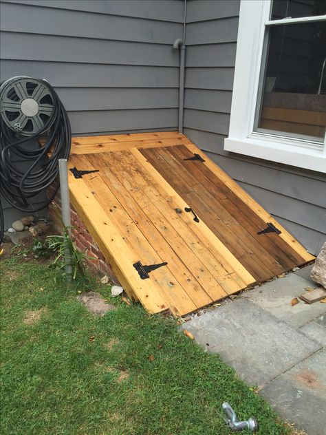 Cellar doors from reclaimed doors. Storm Cellar Doors, Cellar Door Cover, Basement Cellar Door Ideas, Diy Cellar Door, Cellar Door Ideas, Cellar Entrance, Crawl Space Access Door, Basement Egress, Crawl Space Door