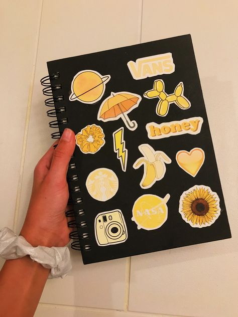 This DIY notebook cover is sooo cute Notebook Ideas Cover Design Diy Aesthetic, Aesthetic Book Covers For School, School Books Aesthetic Cover, Notebook With Stickers On The Cover, Notebook Diy Cover, Notebook Stickers Cover, Note Book Ideas Cover, Creative Note Book Cover Designs, School Book Cover Ideas