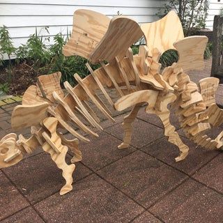 Cardboard Dinosaur Puzzle : 8 Steps (with Pictures) - Instructables Cardboard Dinosaur, 3d Dinosaur Puzzle, 3d Wood Puzzles, Dinosaur Puzzle, Giant Dinosaur, Cardboard Puzzle, Dinosaur Puzzles, Skeleton Model, Scrap Wood Crafts