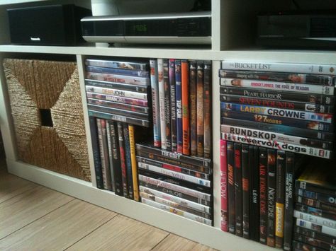 Efficient DVD storage solution for EXPEDIT closet (ikea) Hidden Dvd Storage, Dvd Storage Ideas Living Room, Dvd Storage Ideas Diy, Theater Storage, Organizing Dvds, Diy Dvd Storage Ideas, Ikea Dvd Storage, Dvd Storage Solutions, Ikea Storage Furniture