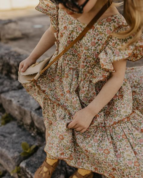 🌼 THERESA LIBERTY FLORAL 🌼 sweet Olive wearing our Ruffled Front Tiered Dress in Theresa Tana Lawn™ Cotton 💛 📸 by @juliadukephoto moccs and purse by @starryknightdesign Tiered Floral Print Mini Dress, Spring Floral Print Mini Tiered Dress, Urban Outfitters Bohemian Floral Print Dresses, Liberty Floral, Floral Print Toddler Dress, Bohemian Floral Print Mini V-neck Dress, Tiered Dress, Summer Collection, Summer Outfits