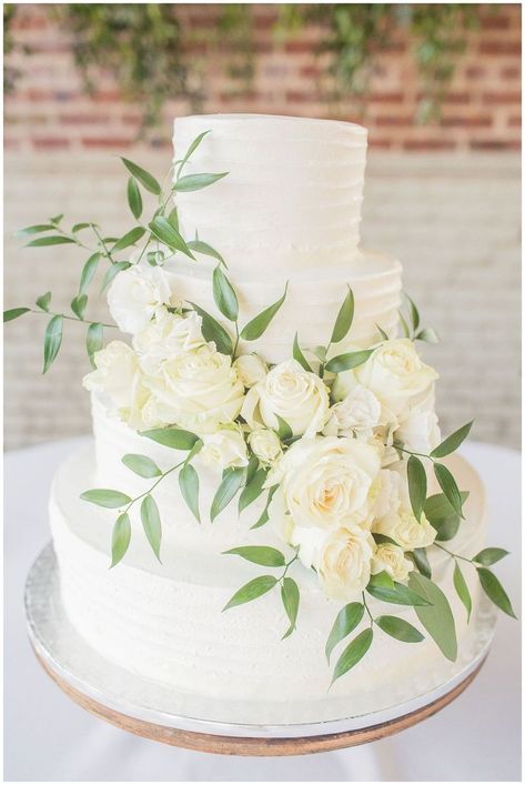 Wedding cake with white and green flowers at a Meridian Aviation Wedding in Meridian Mississippi by Margie's Mixing Bowl Aviation Wedding, Meridian Mississippi, White And Green Flowers, Green Wedding Cake, Mississippi Wedding, Becoming A Pilot, Simple Cake, Wedding Cake Rustic, Sage Green Wedding