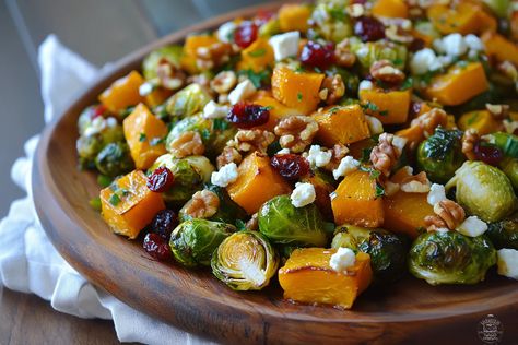 Discover the perfect fall dish: roasted Brussels sprouts and butternut squash with maple walnuts, cranberries, and goat cheese! Brussel Sprout Butternut Squash Goat Cheese, Roasted Brussels Sprouts And Maple Cinnamon Butternut Squash, Butternut Squash Brussel Sprouts Roasted Maple, Roasted Butternut Squash Brussel Sprouts Goat Cheese, Brussels Sprouts Butternut Squash Goat Cheese, Brussel Spouts And Butternut Squash, Squash Brussel Sprouts Cranberries Feta, Squash And Brussel Sprouts Recipes, Butternut Squash And Brussels Recipes