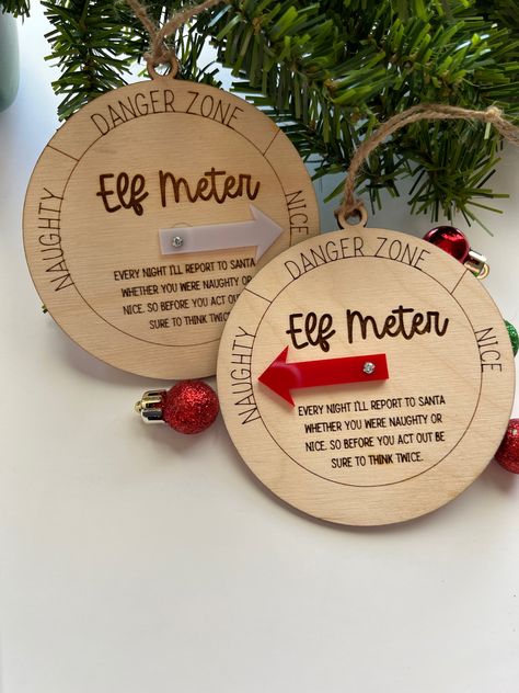 🎄 Elf Meter 🎄 wood engraved, measures 4” round, comes with either red or white acrylic spinning arrow Elves Gift, Laser Cut Wood Crafts, Laser Engraved Ideas, Ornament Svg, Elf Ornaments, Christmas Ornaments Gifts, Wooden Christmas Ornaments, Engraved Gifts, Laser Cut Wood