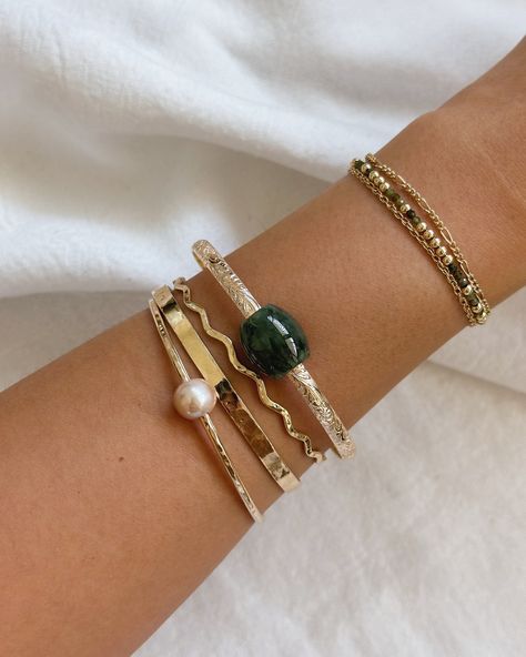 Our Jade Series just got an upgrade with two more stunning designs! Stack, layer, or wear solo—shop these pieces online now.✨ 💚 Deep Green Jade Barrel Necklace 💚 Deep Green Jade Floral Bangle #lainehonolulu #alamoanacenter #pearlridge #manoa #14kgoldfilledjewelry #handmadejewelry #jadebangles #hawaiijewelry Jade Bangle Stack, Jade Bracelet Bangles, Hawaii Jewelry, White Opal Ring, Jewelry Lockets, Jade Bangle, Stacked Bangles, Anklet Bracelet, Stamped Jewelry