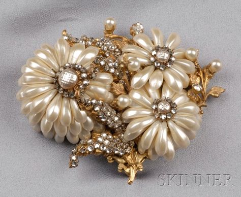 Vintage Chrysanthemum Brooch, Miriam Haskell, designed as a spray of imitation pearl flowers, set with colorless pastes, filigree antiqued yellow metal back, lg. 3 in., with oval signature plaque. Sold for: $1,185 Vintage Chrysanthemum, Miriam Haskell Jewelry, Pearl Flowers, Vintage Jewlery, Turquoise Jewelry Native American, Miriam Haskell, Wedding Tattoos, Fabulous Jewelry, Vintage Jewels