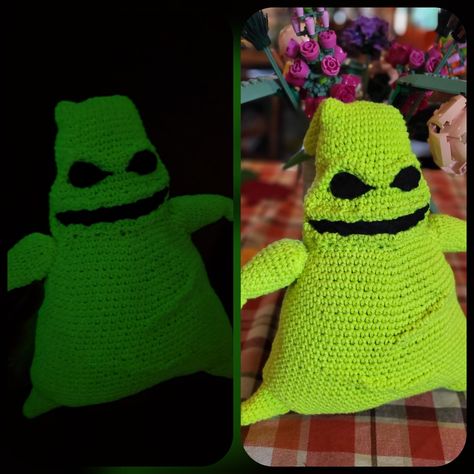 I had to make glow in the dark Oogie Boogie to go along with my Zero! I attempted to scrunch up the fabric to make ridges around the eyes, mouth, and on the body. I think it makes it look a lot better than sewing in extra crocheted strips. I finished him in time to take the kids to Disneyland where we attended the Halloween Oogie Boogie Bash event but of course they forgot to grab him when we were packing.. but he glows really well and I absolutely love him! Glow In The Dark Yarn Crochet, Glow In The Dark Yarn Ideas, Crochet Glow In The Dark, Glow In The Dark Yarn Crochet Patterns, Oogie Boogie Crochet Pattern Free, Oogie Boogie Crochet Pattern, Crochet Oogie Boogie, Halloween Oogie Boogie, Glow In The Dark Crochet