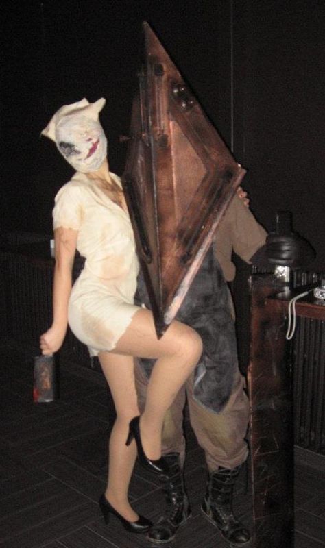 Silent Hill costumes - Pyramide Head and Nurse Silent Hill Couple Costume, Silent Hill Costume Pyramid Head, Nurse From Silent Hill Costume, Bubblehead Nurse Silent Hill, Silent Hill Nurse Aesthetic, Silent Hill Nurse And Pyramid Head, Silent Hill 2 Nurse, Silent Hill Pyramid Head Cosplay, Silent Hill Halloween Costumes