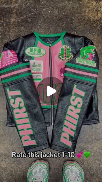 Made By Sista’s on Instagram: "Rate this jacket 1-10? 💕💚 Her Sista’s closet sets the trends with innovative design with a touch of luxury. Thank you for trusting us with your vision 🔥 Who’s next? • • •  #clave #omegapsiphi #purpleandgold #hbcubuzz #hbcudrip #bikerjacket #greekapparel #alphakappaalpha #pinkandgreen #hbcu #hbcuhomecoming #akaparaphernalia #omegapsiphifraternityinc #aka #alphakappaalpha #dst" Aka Paraphernalia, Green Motorcycle, Omega Psi Phi Fraternity, Greek Paraphernalia, Omega Psi Phi, Motorcycle Jackets, Alpha Kappa Alpha, Greek Clothing, Innovative Design