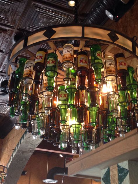 Beer bottle chandelier! Bar Bottle Lighting, Beer Crafts Diy, Patron Bottle Chandelier, Beer Bottle Lights Hanging, Beer Bottle Chandelier, Beer Bottle Diy, Whisky Bottle Chandelier, Liquor Bottle Lights Webstaurantstore, Beer Bottle Crafts