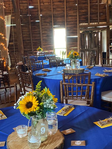 Blue And Yellow Sunflower Wedding, Navy Blue And Yellow Centerpieces, Royal Blue And Sunflower Quinceanera, Blue Roses And Sunflowers Centerpiece, Royal Blue And Yellow Table Setting, Navy Blue And Yellow Party Decorations, Blue Yellow Centerpieces, Blue Roses And Sunflowers Wedding, Blue And Yellow Wedding Table Decor