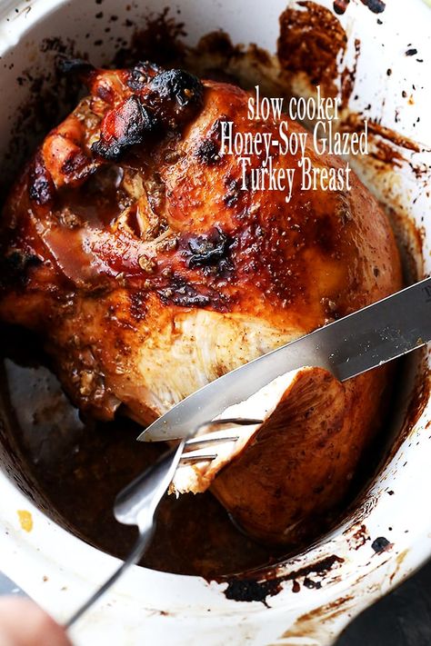 Slow Cooker Honey-Soy Glazed Turkey Breast - Juicy, tender and incredibly delicious turkey breast glazed with a flavorful honey-soy mixture, and prepared in the slow cooker. Honey Turkey Breast, Glazed Turkey Breast, Beef Barbacoa Slow Cooker, Honey Turkey, Turkey Breast Crockpot, Glazed Turkey, Turkey Crockpot Recipes, Beef Barbacoa, Barbacoa Recipe