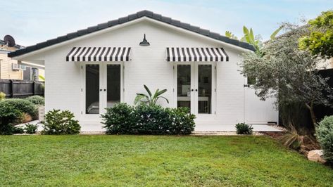 Behind the listing: From 'the ugliest house on the street' to a bright coastal sanctuary Australian Country Houses, Remote Blinds, Weatherboard House, Concrete Bench, Built In Seating, Brick Home, Beach Shack, White Planters, 3 Bedroom House