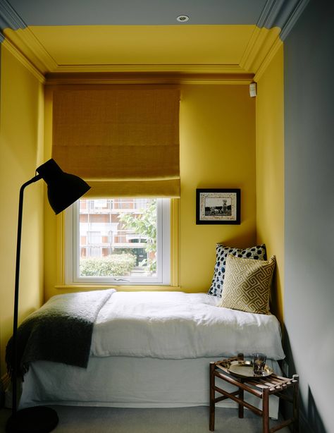 [link url="https://www.stylelibrary.com/sanderson/"]Sanderson[/link]'s 'Mimosa Yellow' paint brightens one of the bedrooms. Very Small Bedroom, Tiny Bedroom Design, Yellow Bedroom Decor, Yellow Room, Small Space Design, Small Bedroom Decor, Yellow Bedroom, London House, Small Room Design