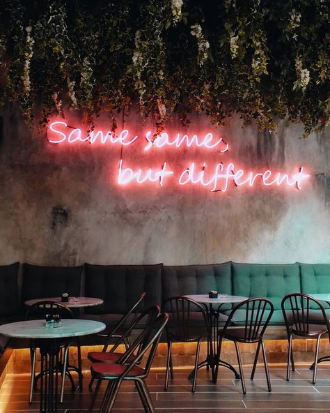 Mood lighting, intimate corners, greenery and neon signage make for the best kind of hangouts, don't you agree? (📸source: https://www.instagram.com/alexand_thecity/) Neon Sign Restaurant Interior, Instagram Corner Ideas, Neon Restaurant Interior, Wall Greenery Decor, Neon Restaurant, Restaurant Neon Sign, Instagram Corner, Instagram Restaurant, Interior Restaurant