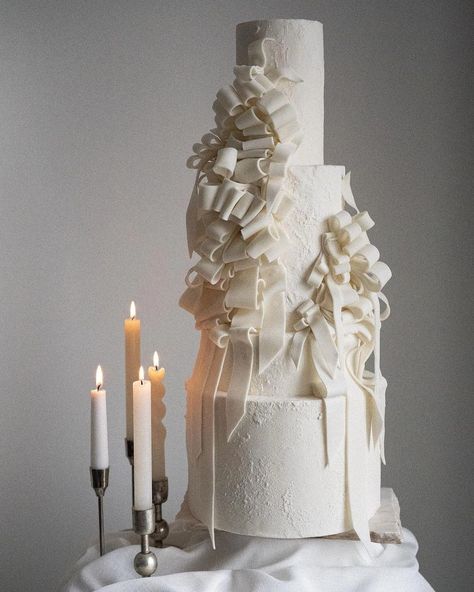 A classic becomes new again, we're loving the hint of the traditional brought up to date! White Fondant Cake, Bow Wedding Cakes, Textured Wedding Cakes, Unique Cakes Designs, Wedding Cake Ideas, Best Cake, Traditional Cakes, White Wedding Cakes, Simple Wedding Cake