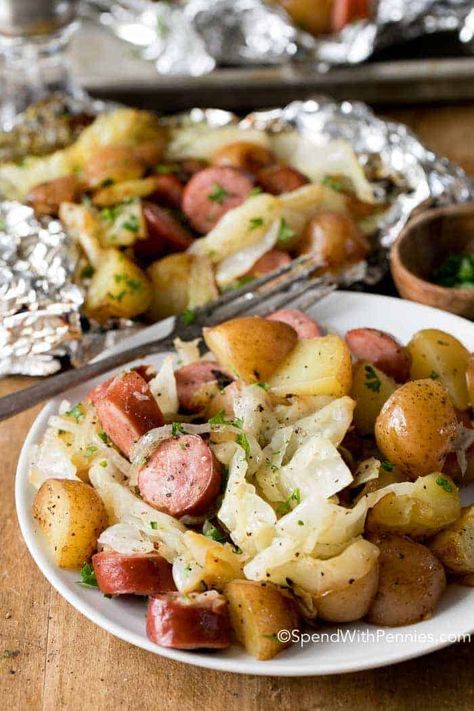 An easy dinner on the grill! Cabbage and sausage foil packets are the perfect effortless easy meal! Tender potatoes, smoky sausage, onion and sweet cabbage seasoned with garlic butter and all cooked in a tidy little packet on the grill! Dinner On The Grill, Classic Coleslaw Recipe, Muffin Bites, Cajun Sausage, Foil Pack Dinners, Foil Packet Dinners, Foil Pack Meals, Foil Dinners, Cabbage And Sausage