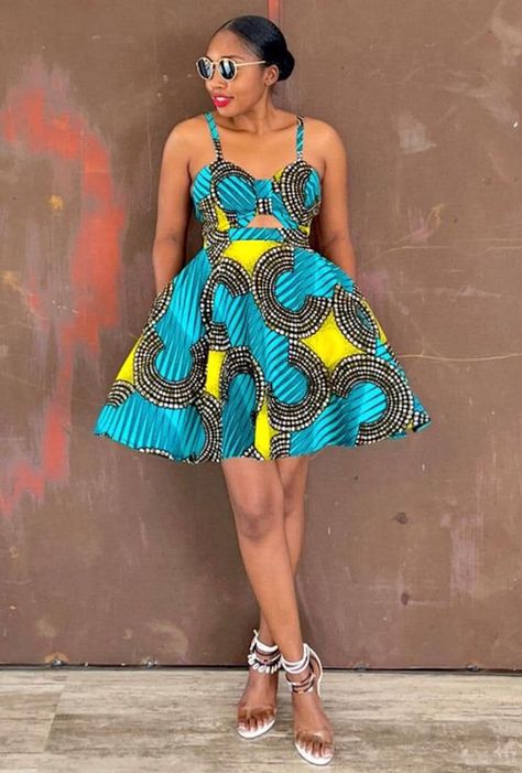 Feeling Tuesday blue never looked so good. A simple style to bring out the freedom in you 💙 #CassisCreations #StyleOnPoint #CassisDesigns #fashion #fashiondesigner #fashiondesign #fashionstyle #africanprint #ghana #ghanaian Chitenge Outfits For Women Dresses, Simple Chitenge Dress, Kitenge Dress Designs, Chitenge Dresses, Chitenge Outfits, Fancy Short Dresses, African Fabric Dress, African Print Dress Ankara, Short African Dresses