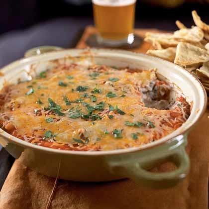 This easy appetizer mixes all of your favorite Mexican flavors for a dip that is sure to be a crowd-pleaser. Serve with pita chips or baked tortilla chips. Dove Chocolate Recipes, Layered Bean Dip Recipe, Tomato Toast Recipe, Inexpensive Appetizers, Easy Bean Dip, Dove Recipes, Cheese Puffs Recipe, Bean Dip Recipe, Layered Bean Dip