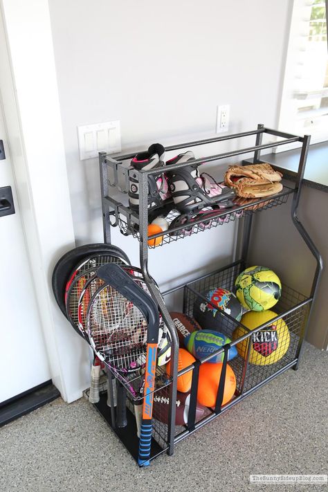 Garage Storage For Sports Equipment, Store Sports Equipment, Storage For Sports Equipment, How To Organize Sports Equipment, Storing Sports Equipment, Sports Rack Storage Ideas, Organizing Sports Equipment, Beach Gear Storage Garage, Outdoor Sports Storage Ideas