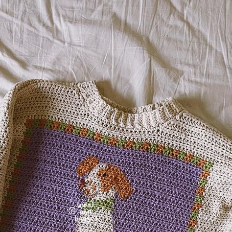 anneli xie & aleksander jaworowski on Instagram: "I heard you all! by popular request, the BEAN SWEATER is now available as a crochet pattern! and it’s GRADED, meaning no maths!!! go grab it on our website or on etsy. 🫘🐶🐕🐩🦮🐕‍🦺❤️ this is a sweater pattern featuring six graphs of our dog Luna and all of her bestest friends, with ample opportunities to modify the graphs to crochet a tapestry based off of your own dog.  the back of the sweater features Luna’s favorite toys – and you are of course welcome to modify them to fit your dog’s mood. the pattern is suitable for advanced beginners and up. link in bio! <3 #beansweater #crochet #crocheting #crochetinspiration #crochetlove #crochetaddict #crochetersofinstagram #crochetsweater" Crochet Sweater Graph Pattern, Crochet Sweater Tapestry, Crochet Tapestry Sweater, Tapestry Crochet Sweater, Tapestry Sweater, Crochet Design Pattern, Bestest Friend, Crochet Tapestry, Crochet Design