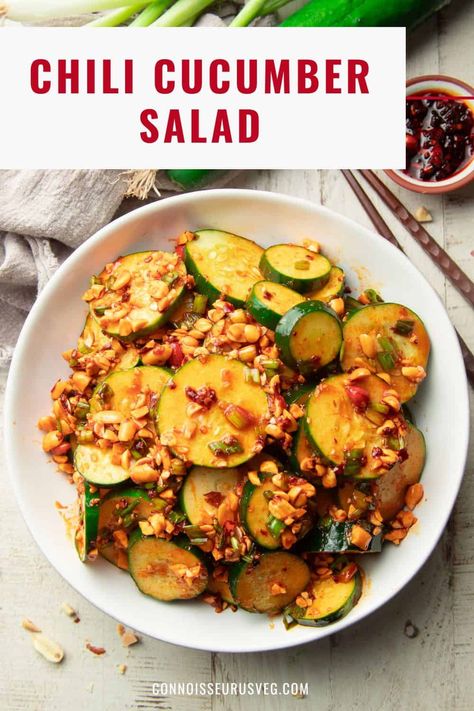 This Asian-inspired chili cucumber salad will be your new favorite summer side dish! It's made with crispy cucumber slices and crunchy peanuts in a kicky sesame dressing. Cucumber Peanut Butter Salad, Peanut Butter Cucumber Salad, Chili Cucumber Salad, Crispy Cucumber, Edamame Recipes Salad, Peanut Butter Salad, Chili Salad, Chili Crunch, Salad Recipes Low Carb