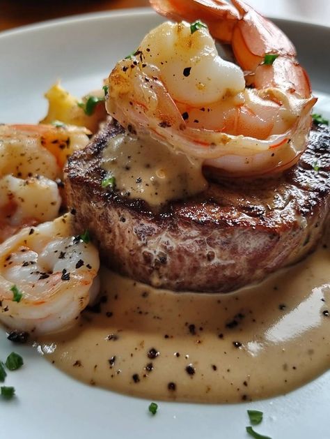 Filet Mignon with Shrimp and Lobster Cream Sauce is a fancy and delicious meal perfect for special occasions. The tender steak pairs beautifully with a rich and creamy seafood sauce, making this dish feel elegant and indulgent. Why Make This Recipe This recipe is great for impressing guests or treating yourself to a special dinner. Filet Mignon With Shrimp And Lobster Sauce, Fancy Dinner Recipes Seafood, Steak Dinner Fancy, Filet Mignon With Shrimp And Lobster Cream Sauce, Steak Oscar With Crab, High End Dinner Recipes, Fancy Dinner Recipes Fine Dining, Sauce For Filet Mignon, Creamy Seafood Sauce