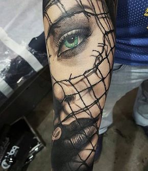 Amazing realism piece with a green eyed girl's face covered with black netting. Tattoo by Sua 1 Tattoo. Green Eyed Girl, Forearm Tattoo Girl, Tatoo 3d, H Tattoo, Girl With Green Eyes, Forearm Tattoo Design, Cool Forearm Tattoos, Geniale Tattoos, Badass Tattoos