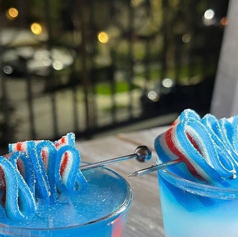 @lou_the_bartender on Instagram: "Bomb Pop Shots 
1/2oz lemon juice 
1/2oz peach schnapps 
1/4oz grenadine 
1/4oz blue curaçao 
3/4oz raspberry vodka 
( garnish with air heads sour belts ) 
#cocktail #cocktails #cocktailrecipes #drinks #partydrinks #bartender #bartenders #mixology #mixologist #bombpop" Bomb Pop Shot, Sour Belts, Bomb Pop, Raspberry Vodka, Drinking Party, Peach Schnapps, Themed Drinks, Blue Curacao, Fancy Drinks