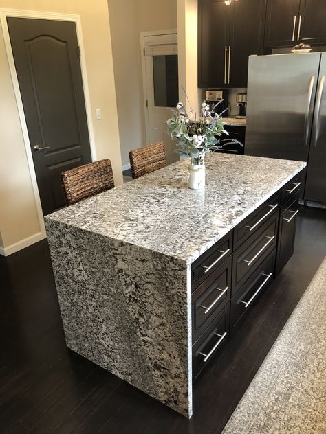 Granite Waterfall Island, Granite Island Kitchen, Granite Waterfall, First Time Home Buyer Tips, Waterfall Island Kitchen, Granite Kitchen Island, Waterfall Countertop, Home Buyer Tips, White Granite Countertops