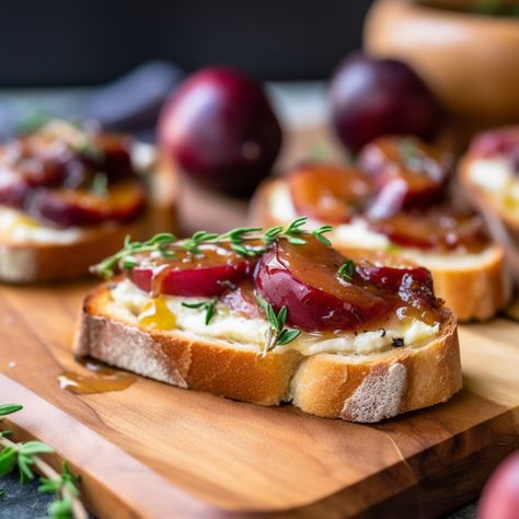 This recipe is a perfect fusion of sweet and savory flavors that meld together in the most delicious way possible. The combination of juicy plums, creamy brie, and aromatic spices creates a unique and flavorful appetizer that is sure to impress your guests. #Food #Recipe #Crostini #Plum #Brie #Entertaining #Friends #Delicious Plum Appetizer Recipes, Plum Recipes Savory, Cranberry Crostini, Brie Appetizers, Bruchetta Appetizers, Brie Crostini, Creamy Brie, Brie Cranberry, Charcuterie Ideas