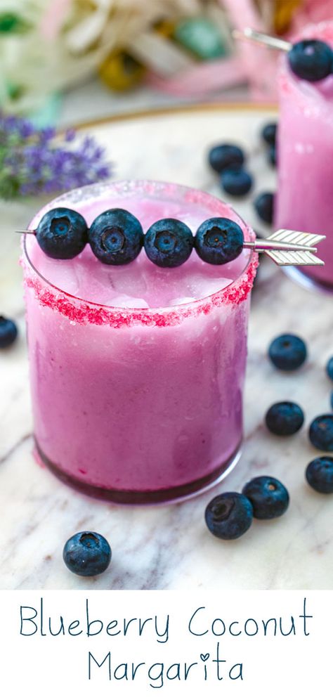 Blueberry Coconut Margarita -- This slightly creamy tropical Blueberry Coconut Margarita will make you feel like you're on a beach... But it can easily be made in your kitchen with just blueberry simple syrup, tequila, and coconut milk! | wearenotmartha.com #margaritas #coconutmilk #blueberry #margaritarecipe #tequilacocktails via @wearenotmartha Blueberry Coconut Margarita, 1800 Coconut Tequila Recipes, February Cocktails, Coconut Milk Cocktail, Kiwi Mojito, Coconut Tequila, Blueberry Drinks, Blueberry Margarita, Blueberry Simple Syrup