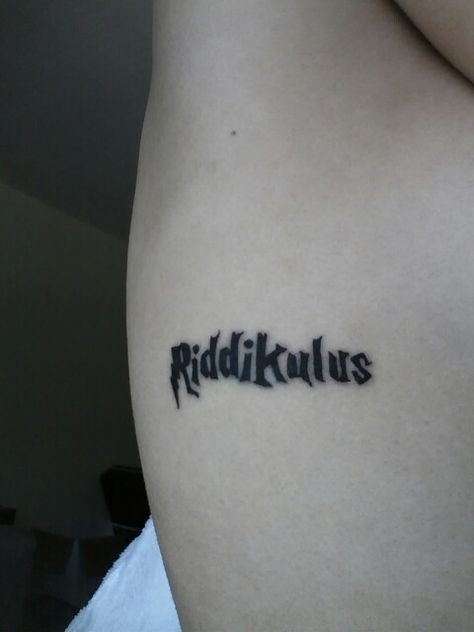 My first tattoo that i got last night. Riddikulus spell. Harry Potter tattoo. Ridikkulus Tattoo Harry Potter, Riddikulus Tattoo, Harry Potter Hogwarts Letter, Hp Tattoo, Harry Potter Quizzes, Potter Tattoo, Harry Potter Spells, Harry Potter Tattoos, Harry Potter Tattoo