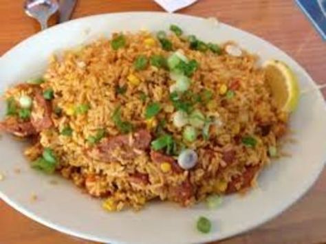 Cajun Fried Rice Recipe - Food.com Cajun Fried Rice, Singapore Foods, Cajun Dirty Rice Recipe, Cajun Rice Recipe, Fried Rice Recipes, Cajun Rice, Cajun Fries, Pilaf Recipes, Cajun Dishes