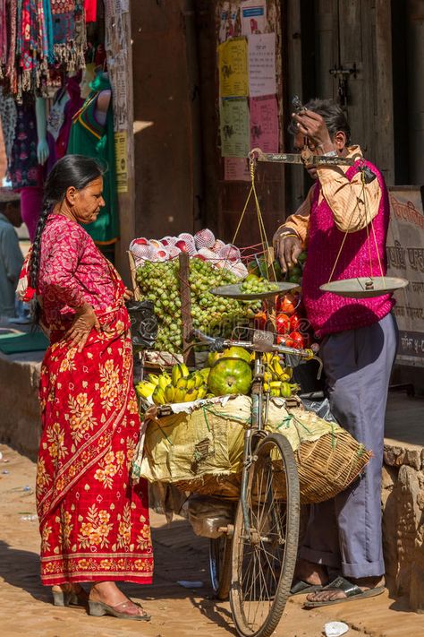 Bicycle fruit shop. Man selling fruit in the streets of Bhaktapur to a woman usi , #spon, #Man, #selling, #shop, #Bicycle, #fruit #ad People In Market, Market Reference, Human Figures, Human Painting, Composition Drawing, People Crowd, Hanuman Pics, Drawing Competition, India Photography