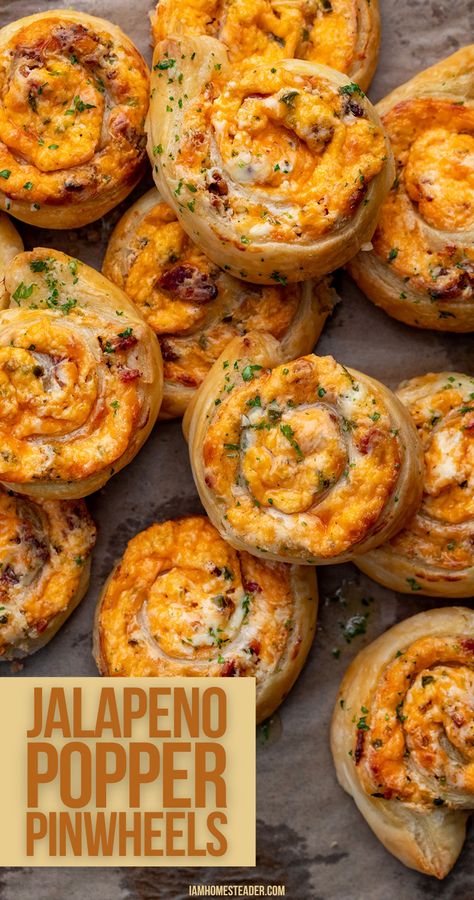 Jalapeno popper pinwheels stacked on a piece of parchment paper. Spicy Appetizers For Party, Gourmet Snacks Appetizers, Putlock Ideas Food, Jalepeno Popper Pinwheel Recipes, Pinwheels Appetizers Baked, Jalepeno Popper Rollups, Jalapeno Popper Biscuits, Puff Pastry Football Snacks, Easy Prep Appetizers