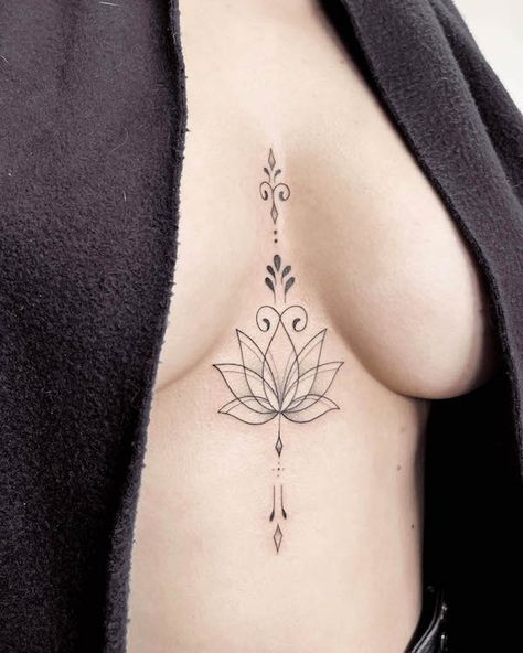 38 Elegant Oriental Tattoos with Meaning - Our Mindful Life Lotus Flower Tattoo Chest For Women, Tattoos Inbetween Breast Flower, Chest Lotus Tattoo, Tatoos Between The Chest, Tattoo Ideas Female Middle Of Chest, Fan Tattoos For Women, Lotus Flower Tattoo Between Breast, Lotus Flower Chest Tattoo Female, Small Women Tattoos With Meaning