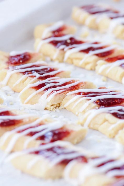 Jam Diagonals are a fun version of a thumbprint cookie.  They are also known as Split Second cookies.  Fill them with your favorite flavor of jam. #cookies #jam #christmascookie #shortbreadcookie #easy #recipe Jam Diagonal Cookies, Raspberry Diagonal Cookies, Split Seconds Cookies, Jam Diagonals, Bar Treats, Jam Bars, Thumbprint Cookie, Christmas Shortbread, Mom Recipes