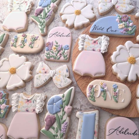 Adelaide is a Wild One! A seriously sweet and beautiful theme with tons of wildflowers. I love florals no matter the season, and this set made me smile. I truly hope they family enjoyed the party and their little wildflower turning one! Happy Birthday Adelaide 🎂 . . . #wildflowers #wildflowerbirthday #alittlewildflowerisontheway #decoratedsugarcookies #sugarcookiesofinstagram #floraldesign #eddieprinter #flowersinbloom #wildone #wildonebirthday #sweetgirl #girlbirthday #birthdaycook... Wild One Birthday Party Girls Diy Flower, Wild One Birthday Party Girls Flowers, Wild One Girls 1st Birthday, Wildflower First Birthday Girl, Wild One Flower First Birthday, Wildflower Birthday Party, One Happy Birthday, Wildflower Birthday, Made Me Smile