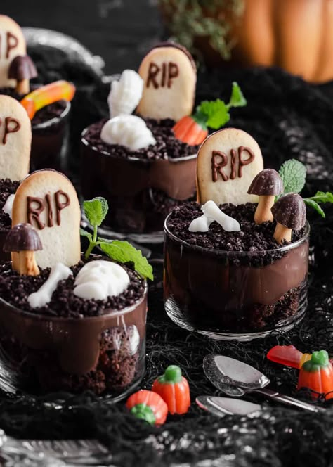 Halloween Dirt Pudding Cups - Celebrations at Home Dirt Cake Pudding Cups, Dirt Pudding Halloween Graveyard, Halloween Fruit Parfait, Halloween Cake Mold Recipes, Dirt In A Cup Dessert, Halloween Creme Brulee, Halloween Graveyard Dirt Cups, Mini Couldren Snacks, Halloween Dirt Cups Dessert