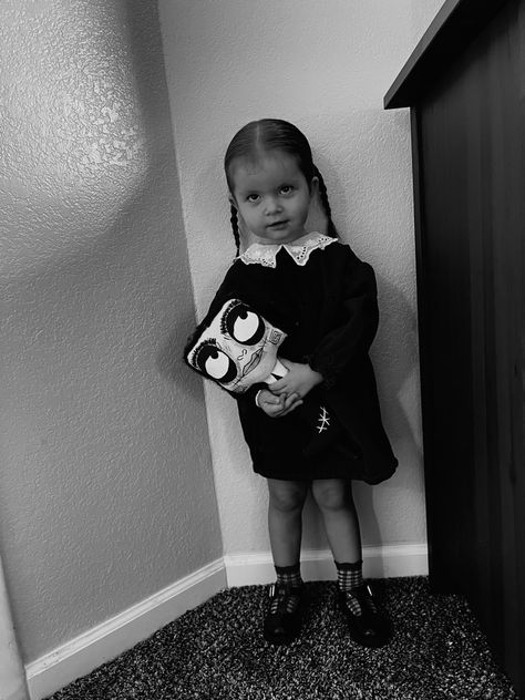 Toddler Wednesday Addams costume Toddler Wednesday Addams Costume, Baby Wednesday Addams, Halloween Costume 2023, Wednesday Addams Costume, Toddler Photoshoot, Goth Baby, Toddler Costumes, Toddler Halloween, Wednesday Addams