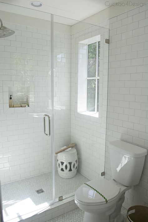 The Southern Living Idea House 2017 is located on Bald Head Island NC with inspiration from the surroundings, eye-catching colors and an open floor plan. Penny Tile And Marble Bathroom, Penny Tile Bathroom, Penny Tiles Bathroom, White Subway Tile Shower, White Subway Tile Bathroom, Southern Living Idea House, Marble Bathtub, Subway Tile Showers, Suite Ideas