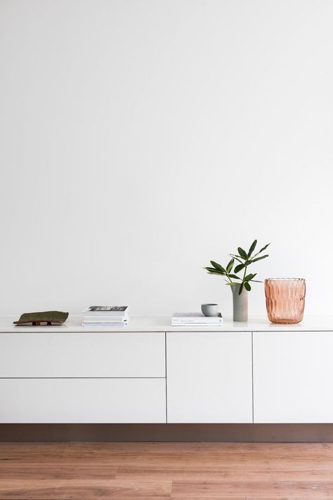 Aug 7, 2018 - Working with limited space, this Port Melbourne home was completely transformed both inside and out by local studio Winter Architecture. Winter Architecture, Port Melbourne, Black And White Furniture, Melbourne Home, Melbourne House, White Sideboard, Living Room White, Livingroom Layout, Living Room Diy