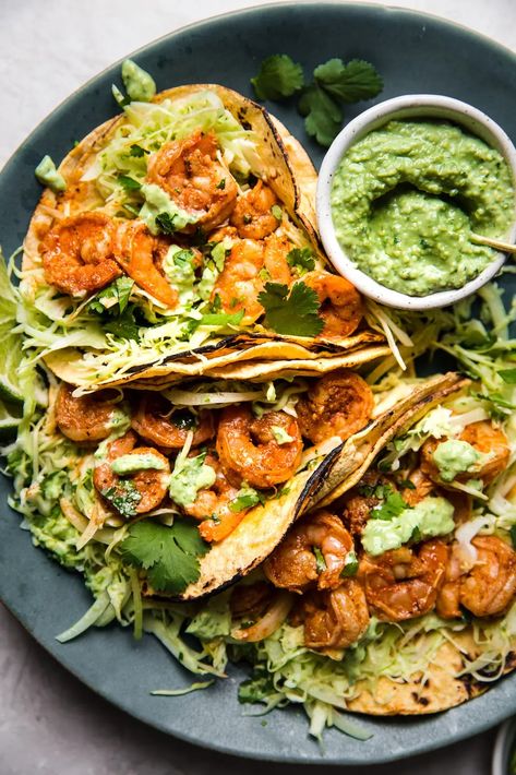 Fresh and delicious, this easy shrimp taco recipe comes complete with a slightly spicy avocado crema and topped with a crispy cabbage slaw that’s totally irresistible. Crispy Cabbage, Shrimp Tacos Easy, Easy Weeknight Dinners Healthy, Shrimp Taco, Shrimp Taco Recipes, The Modern Proper, Modern Proper, Avocado Crema, Seafood Entrees