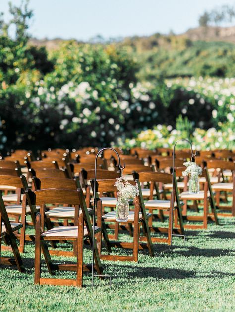 Fruitwood Folding Chairs for Ceremony. Honey Honey Photography Wood Chair Wedding Reception, Wooden Chairs Wedding, Brown Chairs Wedding, Brown Chairs Wedding Ceremony, Brown Garden Chairs Wedding, Fruitwood Folding Chairs Wedding, Wooden Folding Chairs Wedding, Dark Wood Folding Chairs Wedding, Mahogany Chiavari Chairs Wedding