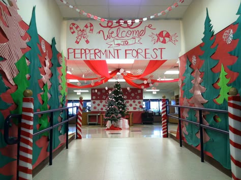 School decorations for winter season. Peppermint can't offend anyone, right? #pcdecor #schooldecorations #winterdecorations #peppermintforest School Christmas Fair Decorations, Decorate School For Christmas, Class Christmas Party Decorations, Winter Hall Decorations School, Christmas Themes For School Hallways, Christmas Daycare Decorations, Elementary Christmas Decorations, Christmas Decor At School, Christmas Decorations At School