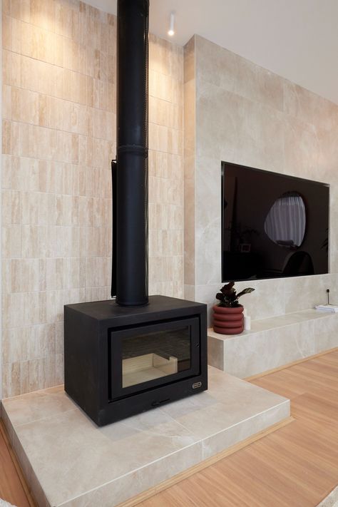 Talk about a dream fireplace! 😍   Peter & Lara designed this gorgeous living room for Elle's new dream home, complete with our Mineral Natural Travertine Tumbled 50x200 behind the fireplace and our Quantum Marfil GL-Porc 600x1200 underneath the fireplace and on the feature wall next to it 🤩   Missed an episode of Dream Home? Watch it now on Channel 7 and 7plus!   #DreamHomeAU Dream Home Channel 7, Farmhouse Laminate Flooring, Dark Grey Laminate Flooring, Brown Laminate Flooring, Grey Laminate Flooring, Dream Fireplace, Gorgeous Living Room, Scandinavian Tile, Tiles Living Room