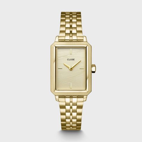 Add a sense of luxury and sophistication to your look with the Fluette watch for women. Featuring a polished 30.6 mm gold coloured rectangular case, 14 mm stainless steel link strap and a gold coloured sand-textured dial evoking the warmth of summer sand. Easily customize the look of your watch with any 14 mm strap. You can adjust the strap size by yourself. Rectangular Watch, Sand Texture, Thomas Sabo Bracelet, Sand Textures, Blue Topaz Bracelet, Gold Sand, Colored Sand, Watch For Women, Jewelry Candles